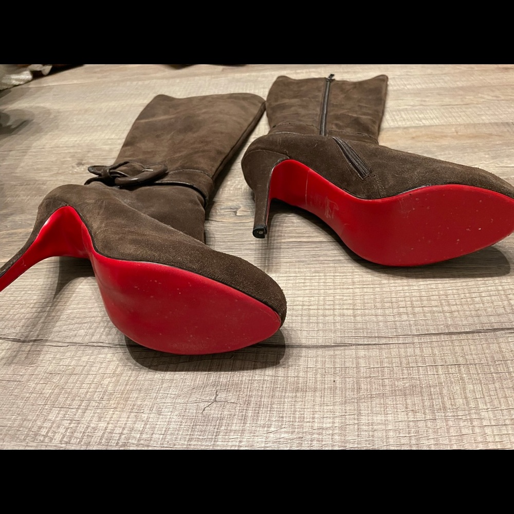 Louboutin brown suede heeled boots.